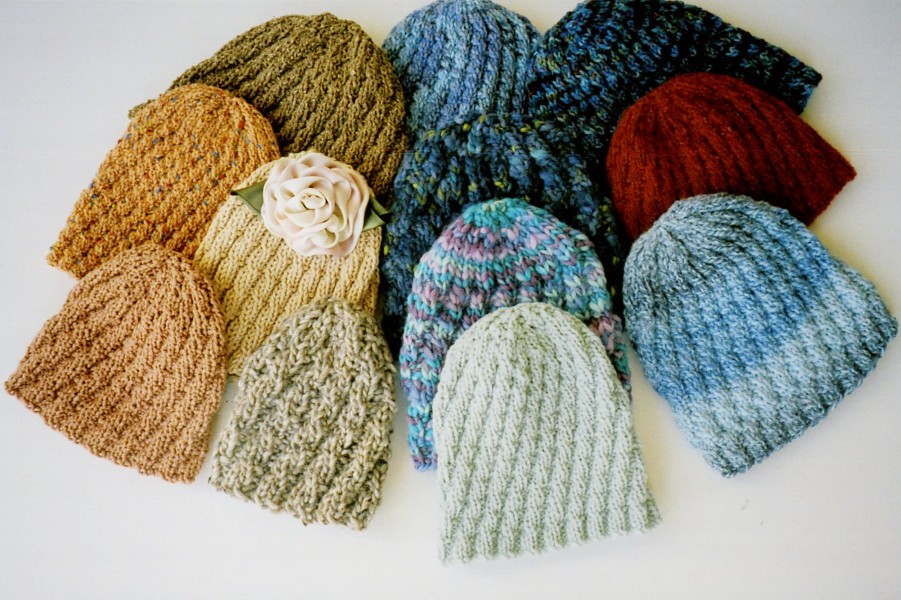 Ann Norling 54 Spiral Rib Hat in 8 different gauges of yarn for child to large adult.